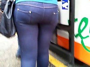 Big round ass in tight jeans pants