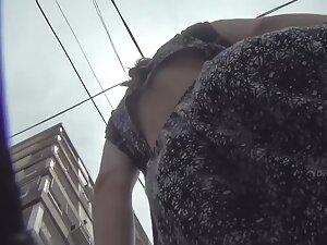 Sexy thong isn't covering her hot pussy in upskirt Picture 5