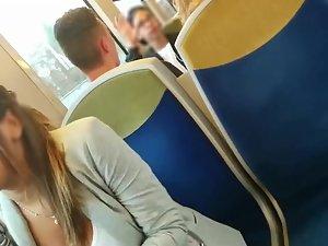 Downblouse of busty beauty in the train Picture 1