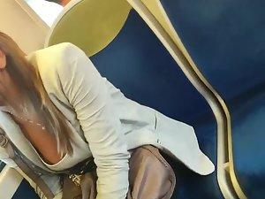 Downblouse of busty beauty in the train Picture 6
