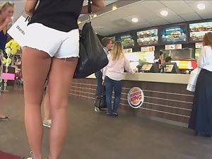 Tall blonde looks sexy in white shorts Picture 4