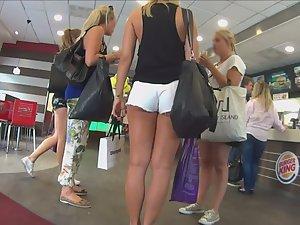 Tall blonde looks sexy in white shorts Picture 8