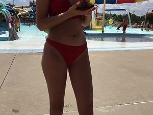 Sexy girl in red two piece bikini at the swimming pool Picture 3