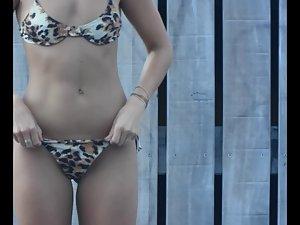 Shaved pussy in leopard thong bikini Picture 4