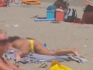 Discreet masturbation on public beach
