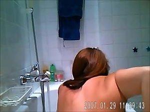Hot chubby girl spied taking a bath Picture 2