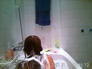 Hot chubby girl spied taking a bath Picture 4