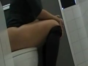 Terrific ass peeped as she pee and wipe Picture 2