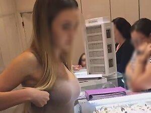 Busty store clerk at a jewelry shop