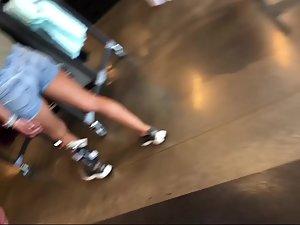 Voyeur follows a sporty girl into the sports store Picture 1