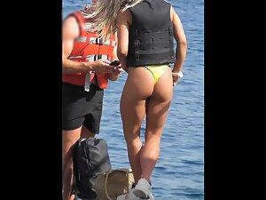 Epic blonde in yellow bikini caught on beach Picture 4