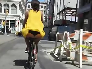 Funny view of her thong on a bicycle