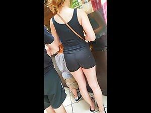 Young milf in tight shorts at the shopping mall Picture 1