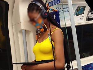 Checking out lovely black girl's tits on the train Picture 4