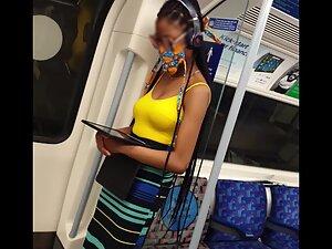 Checking out lovely black girl's tits on the train Picture 5