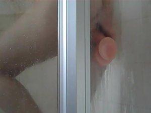 Peep her ride the sticky dildo in a shower Picture 2