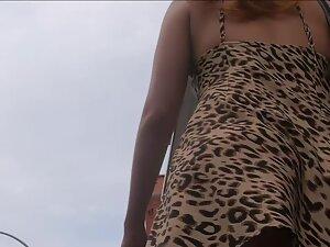 Upskirt of redhead hottie in leopard mini dress Picture 8