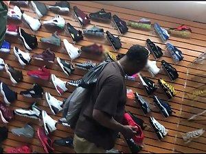 Black girl's hard nipples are visible in shoe store Picture 3