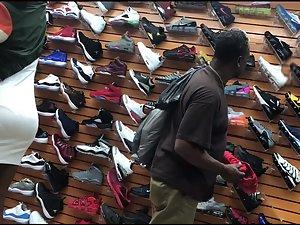 Black girl's hard nipples are visible in shoe store Picture 4