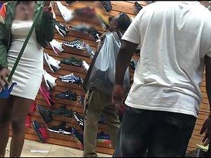 Black girl's hard nipples are visible in shoe store Picture 8