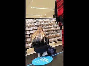 Athletic looking blonde bends over a lot Picture 2