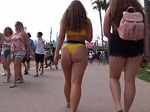 Big booty walks away and wiggles into shorts Picture 4