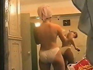 Undressed women spied in a locker room Picture 1