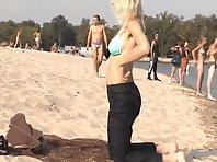 Blonde nudist girl at a beach Picture 2