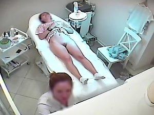 Hidden camera spying on girl getting wax job Picture 1