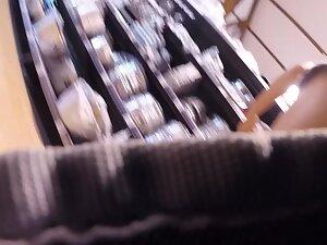 Voyeur caught her upskirt when she bent over Picture 2