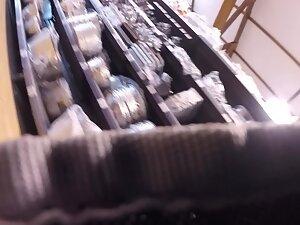 Voyeur caught her upskirt when she bent over Picture 5