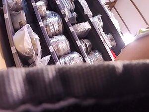 Voyeur caught her upskirt when she bent over Picture 6