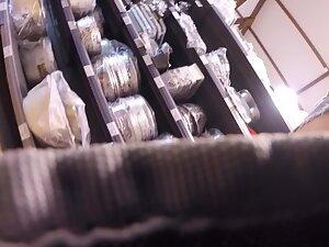 Voyeur caught her upskirt when she bent over Picture 7