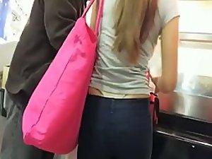 Spying on a high riding thong in a line Picture 1