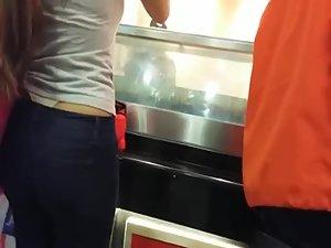 Spying on a high riding thong in a line Picture 5