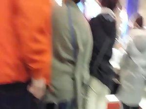 Spying on a high riding thong in a line Picture 6