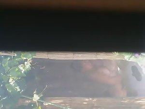 Mature woman spied during a shower Picture 1