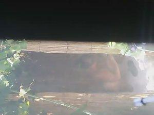 Mature woman spied during a shower Picture 3