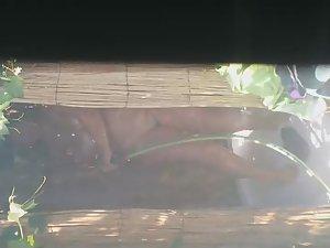 Mature woman spied during a shower Picture 5