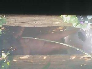 Mature woman spied during a shower Picture 6