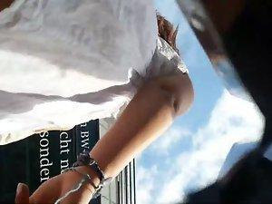 Awesome way to see many upskirt Picture 7