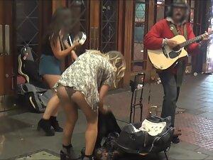 Upskirt after dancing next to a street musician Picture 5