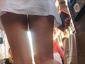 Tiny thong in upskirt during hottie's lunch time