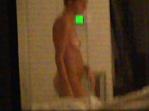 Quick peep on naked neighbor through her window Picture 6
