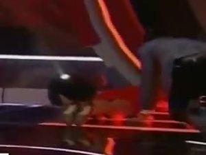 Clumsy girl shows off on the television