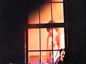 Mature woman rubbing lotion on tits Picture 1