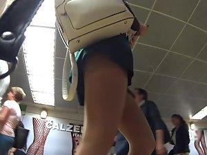Luxury upskirt on moving stairs Picture 1
