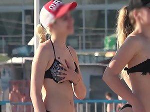 Teen girl touching her friend's ass on the beach Picture 4