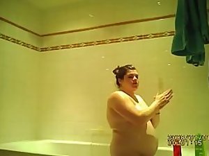 Fat woman spied in the shower