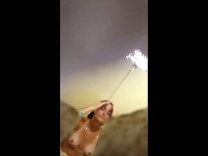 Spying on yummy tits with tan lines in shower Picture 7